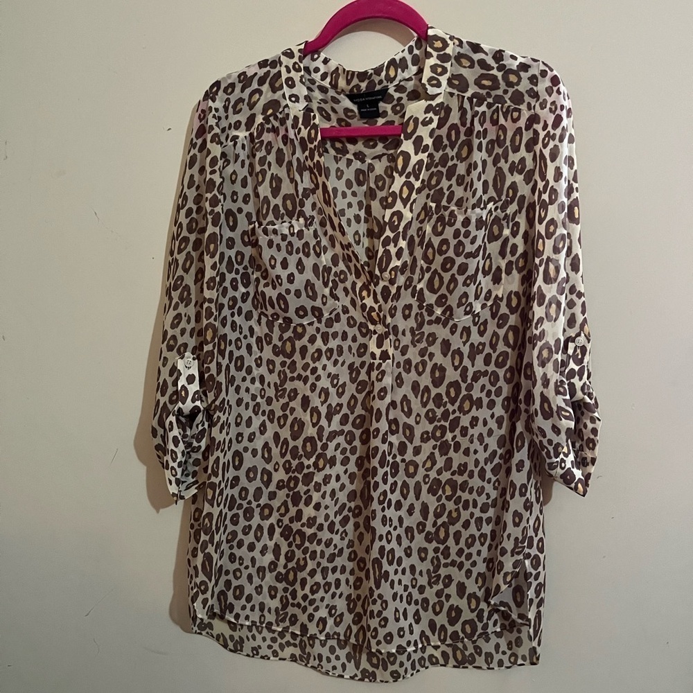 Moda cheetah print size large 100 percent polyester colors brown yellow cream.